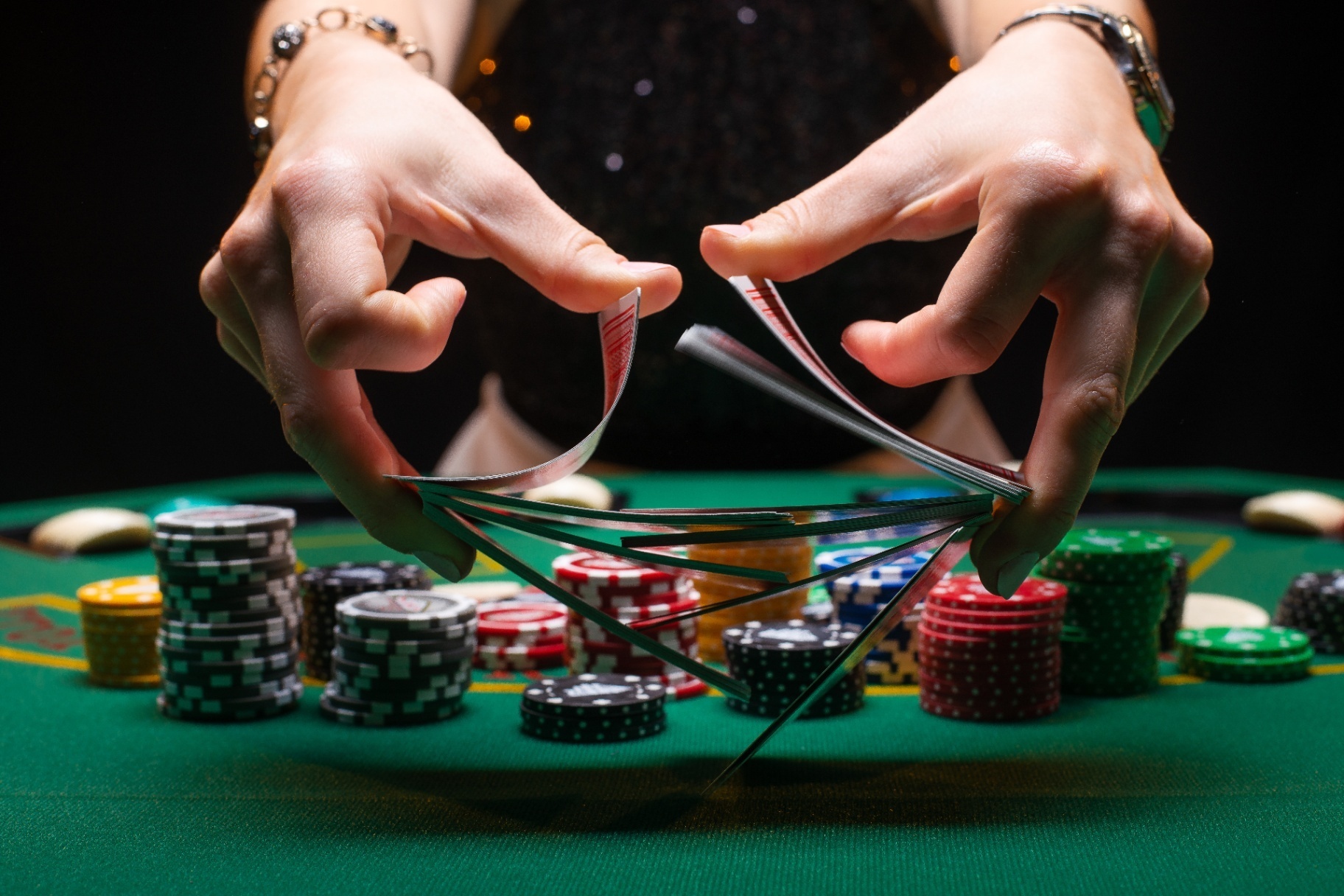 A close up of hands shuffling a deck of cards over a poker table. An addiction therapist in Palm Beach, FL can offer support with many types of addiction in Palm Beach, FL. Learn more about addiction counseling in Miami, FL and how we can help you find support today. 