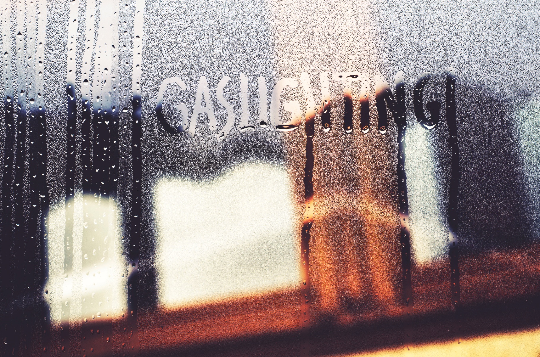 A close up of a wet window with the word gaslighting written using a finger. Learn how a narcissism therapist in Palm Beach, FL can offer support for gaslighting by searching treatment for narcissism in Palm Beach, FL today. Online therapy in Florida can offer support from the comfort of home.