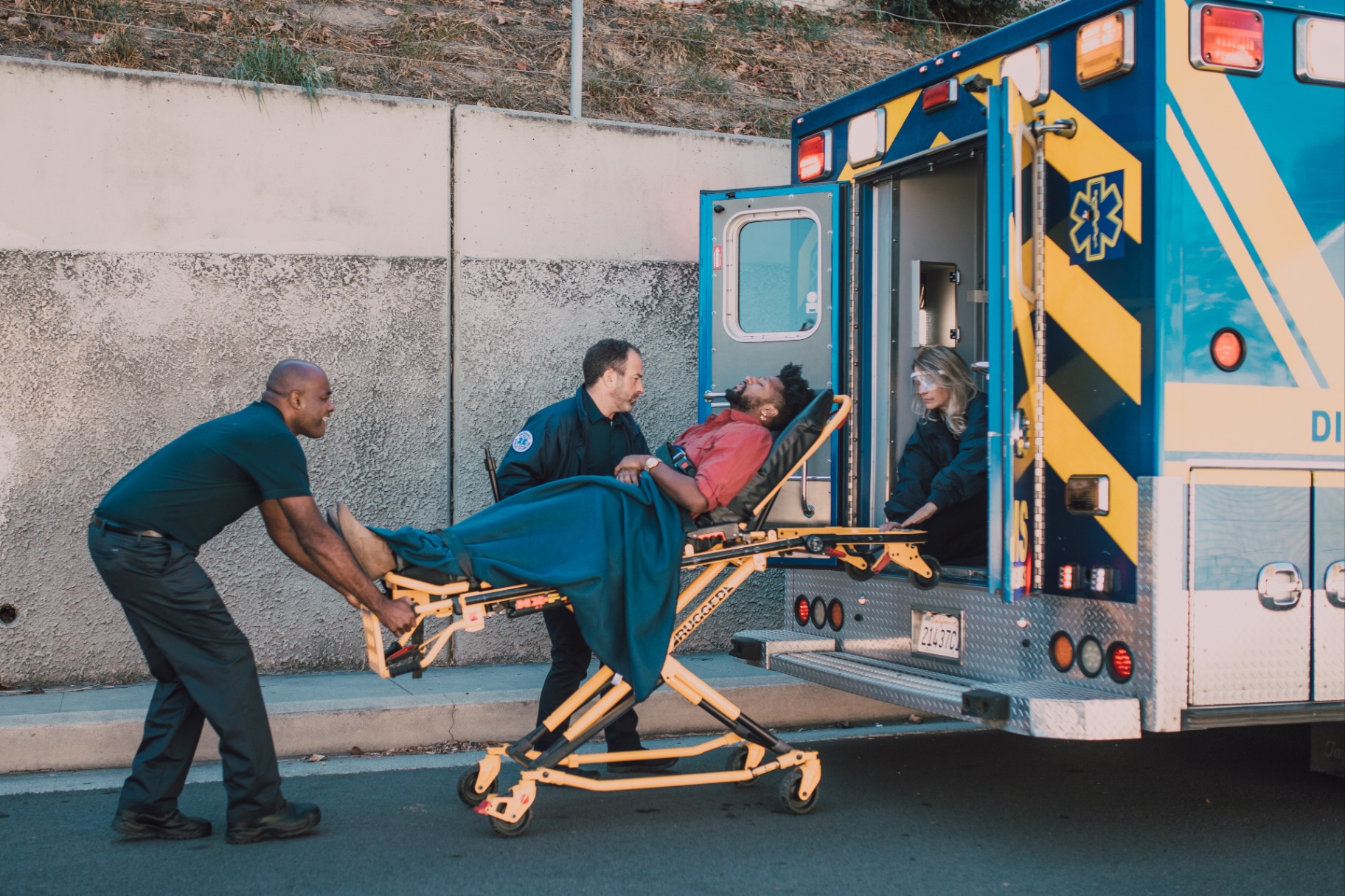 EMTs load a person into an ambulance. Learn how EMDR in Palm Beach, FL can help first responders overcome trauma. Contact a trauma therapist in Delray Beach, FL to learn more about EMDR therapy in Delray Beach, FL and other services. 