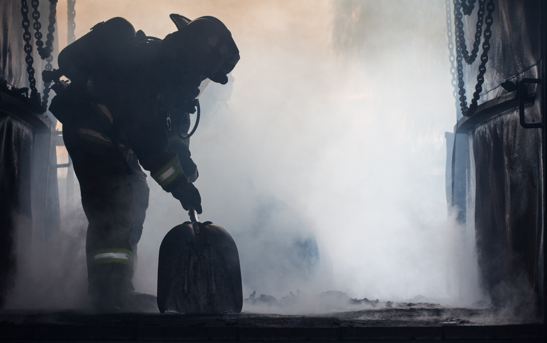 A silhouette of a firefighter surrounded by smoke. Learn more about the support EMDR therapy in Delray Beach, FL can offer by contacting a trauma therapist in Delray Beach, FL. EMDR in Palm Beach County, FL can help you today.