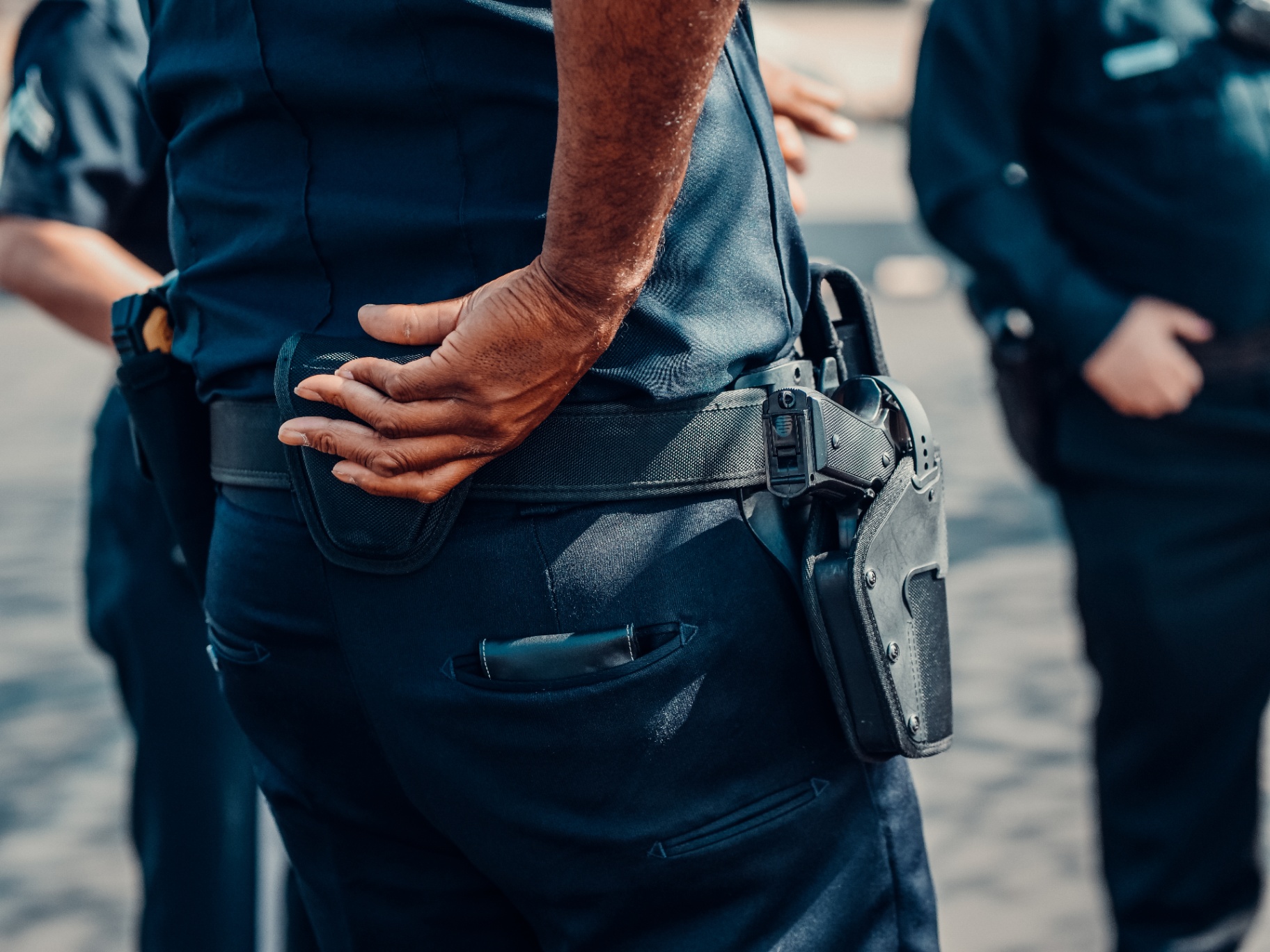 A close up of an officer standing with other cops. Learn how an EMDR therapist in Palm Beach County, FL can support first responders. Contact a trauma therapist in Delray Beach, FL to learn more about EMDR in Palm Beach County, FL today. 