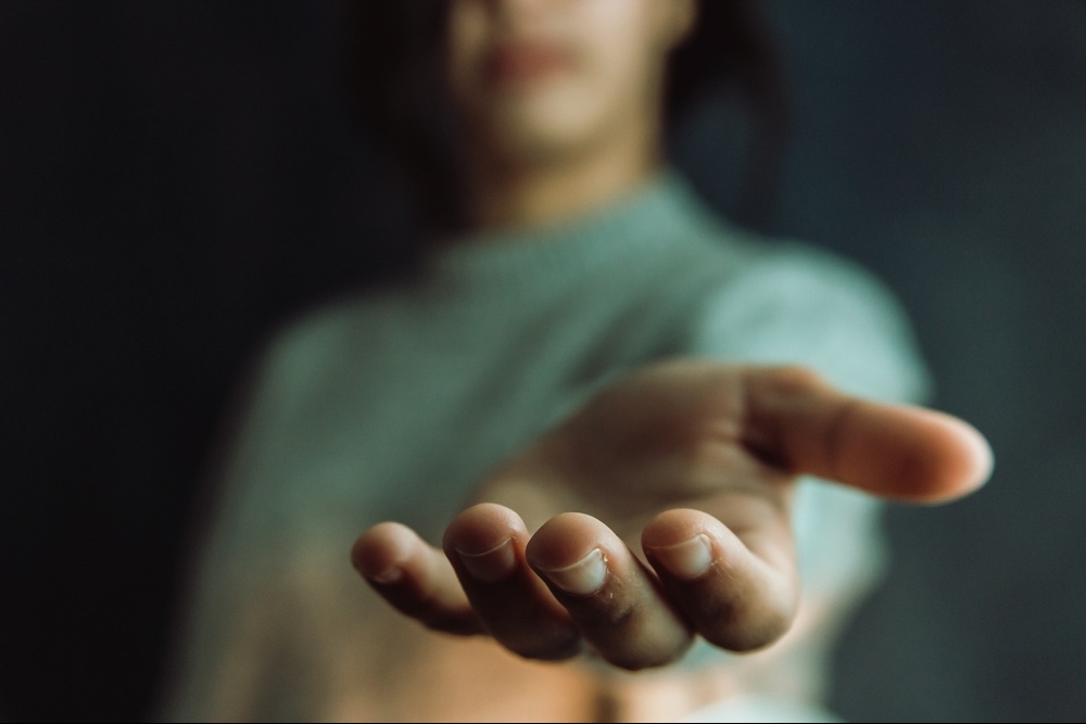 A close up of a person reaching out with a helping hand. Learn how a trauma therapist in Delray Beach, FL can offer support by searching for EMDR therapy in Palm Beach, FL. Search for EMDR in Palm Beach County, FL or trauma treatment in Palm Beach, FL. 