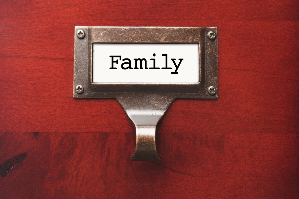 A close up of a door sign that reads family. Learn how a trauma therapist in Delray Beach, FL can help you better understand yourself and others. Search for trauma treatment in Palm Beach County, FL for more tips today.