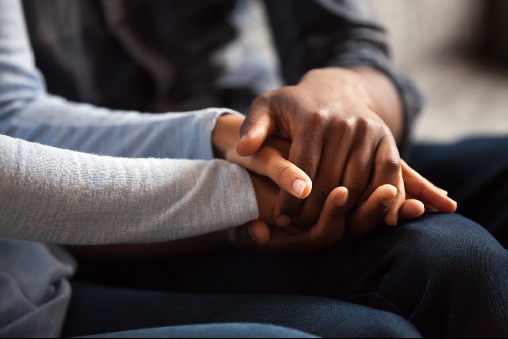 A close up of a couple holding hands. This could represent the support that trauma therapy in Delray Beach, FL offers for improving relationships. Search for a therapist in Delray Beach, FL and learn more about trauma treatment in Palm Beach County, FL today.