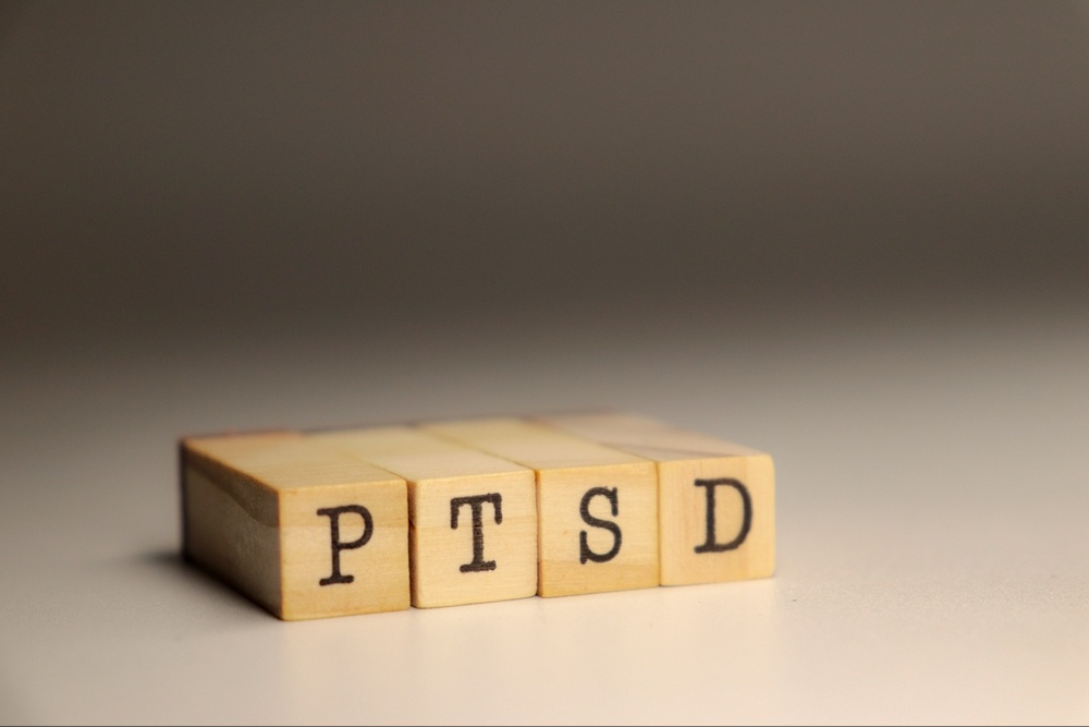 A close up of block letters spelling PTSD. Learn how trauma therapy in Delray Beach, FL can help you cope with past trauma by contacting a trauma therapist in Delray Beach, FL. Search for trauma treatment in Palm Beach, FL to learn more. 